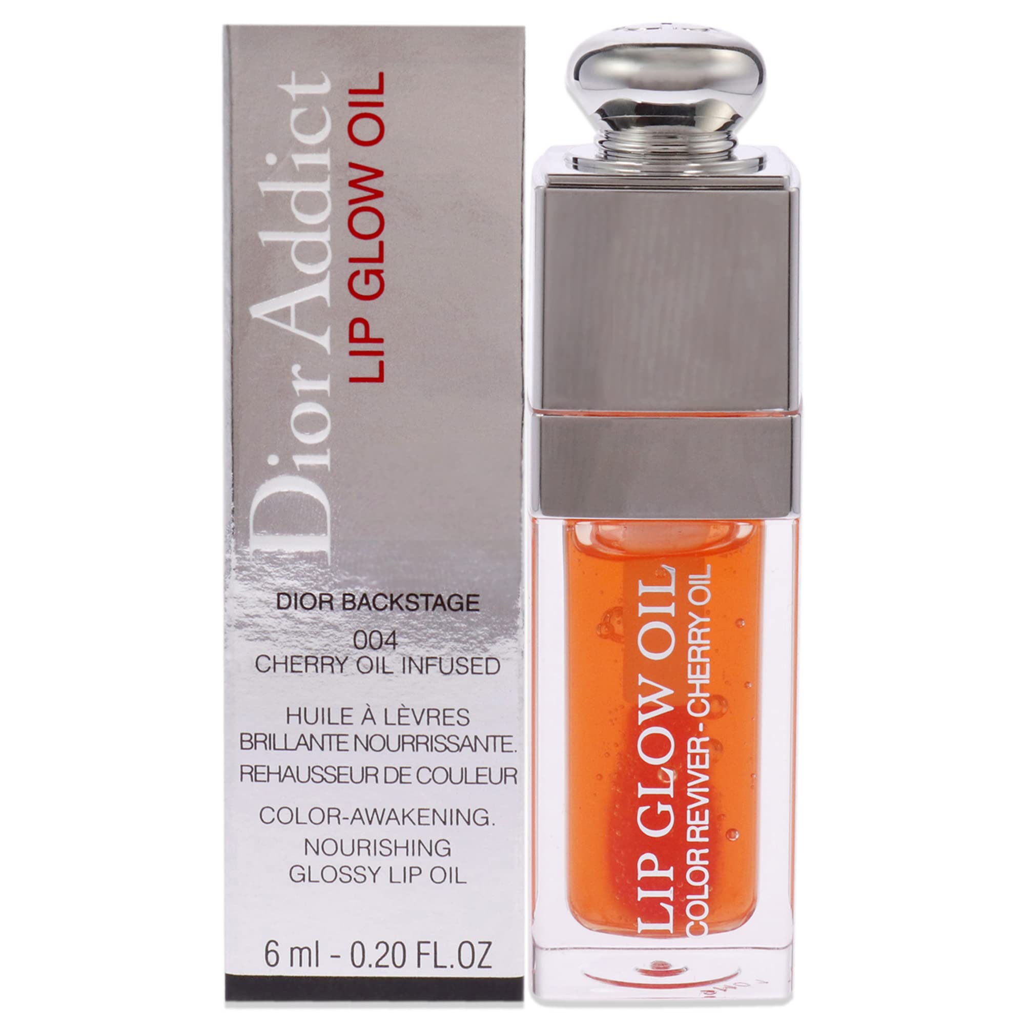 Christian Dior Dior Addict Lip Glow Oil 0.2 fl oz in shade 004, a cherry oil-infused nourishing lip gloss with a glossy finish. Premium lip makeup from Dior in sleek packaging.
